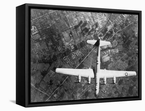 American B-29 Super Fortress Bomber over Nakajima Aircraft Co.-null-Framed Stretched Canvas