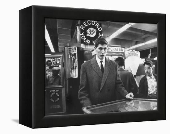 American Chess Champion Robert J. Fischer Playing Pinball-Carl Mydans-Framed Premier Image Canvas