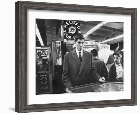 American Chess Champion Robert J. Fischer Playing Pinball-Carl Mydans-Framed Premium Photographic Print