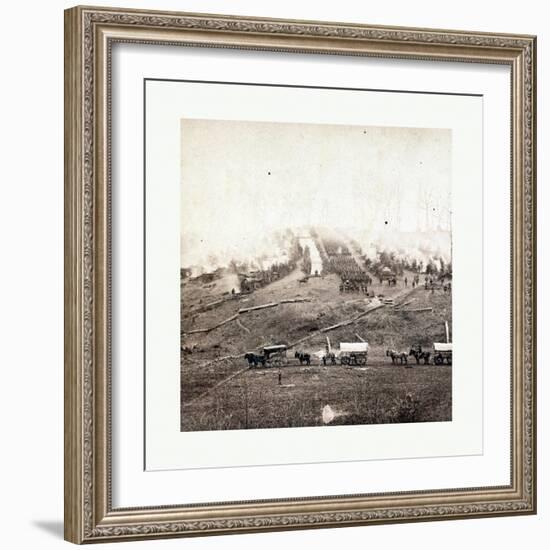 American Civil War: Three Horse-Drawn Covered Wagons in the Foreground. Soldiers Marching in Format-null-Framed Giclee Print