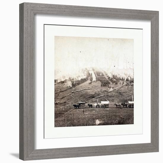 American Civil War: Three Horse-Drawn Covered Wagons in the Foreground. Soldiers Marching in Format-null-Framed Giclee Print