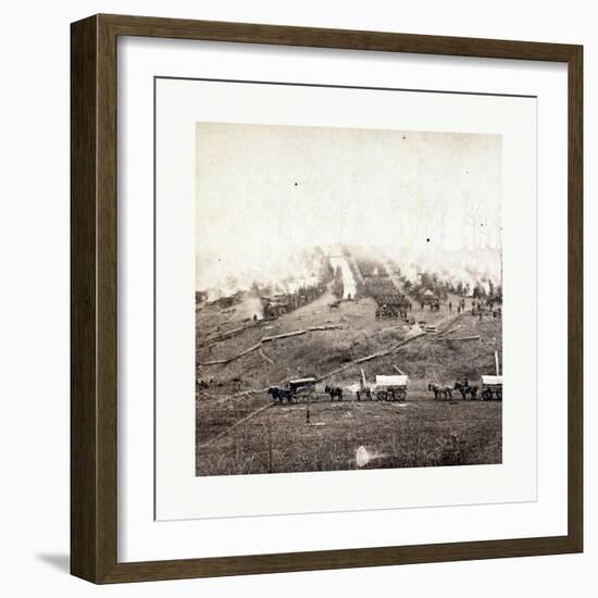 American Civil War: Three Horse-Drawn Covered Wagons in the Foreground. Soldiers Marching in Format-null-Framed Giclee Print