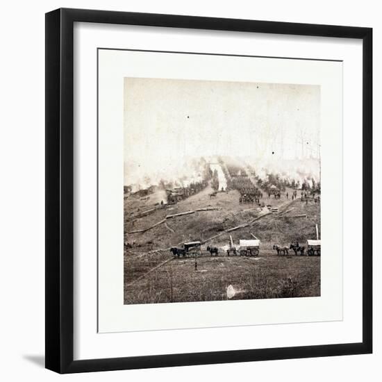 American Civil War: Three Horse-Drawn Covered Wagons in the Foreground. Soldiers Marching in Format-null-Framed Giclee Print