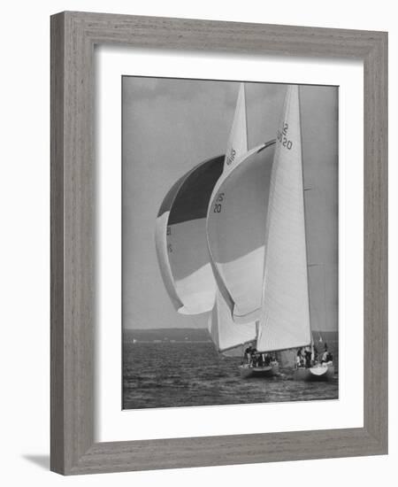 American Eagle is Overtaken by Constellation During Cup Trails-George Silk-Framed Photographic Print