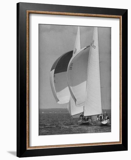 American Eagle is Overtaken by Constellation During Cup Trails-George Silk-Framed Photographic Print