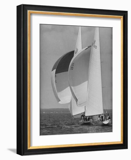 American Eagle is Overtaken by Constellation During Cup Trails-George Silk-Framed Photographic Print