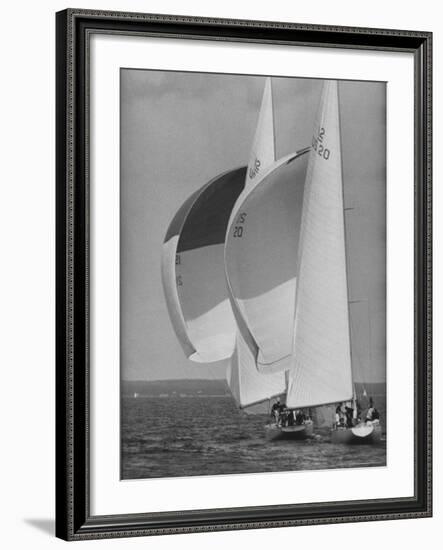 American Eagle is Overtaken by Constellation During Cup Trails-George Silk-Framed Photographic Print