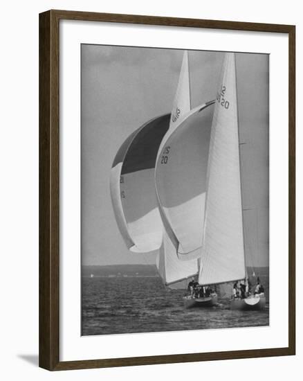 American Eagle is Overtaken by Constellation During Cup Trails-George Silk-Framed Photographic Print