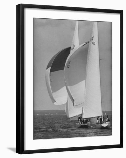 American Eagle is Overtaken by Constellation During Cup Trails-George Silk-Framed Photographic Print