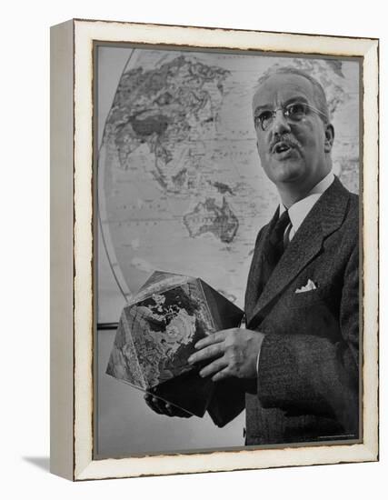 American Engineer and Architect Buckminster Fuller Holding a Globe-Andreas Feininger-Framed Premier Image Canvas