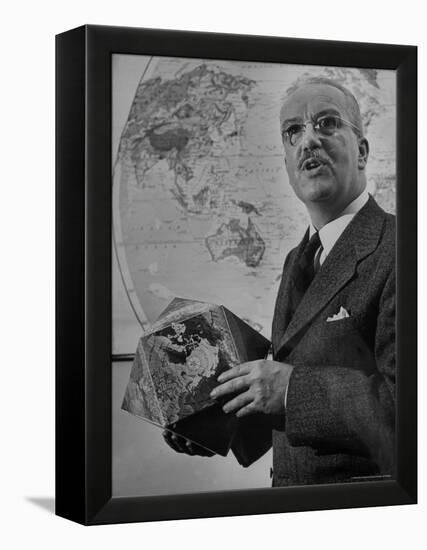 American Engineer and Architect Buckminster Fuller Holding a Globe-Andreas Feininger-Framed Premier Image Canvas