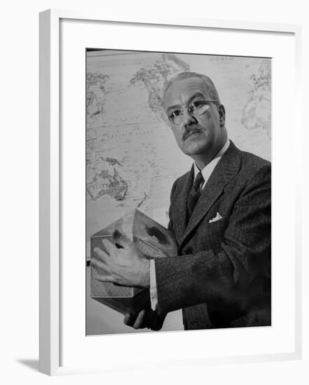 American Engineer and Architect Buckminster Fuller Holding a Globe-null-Framed Photographic Print