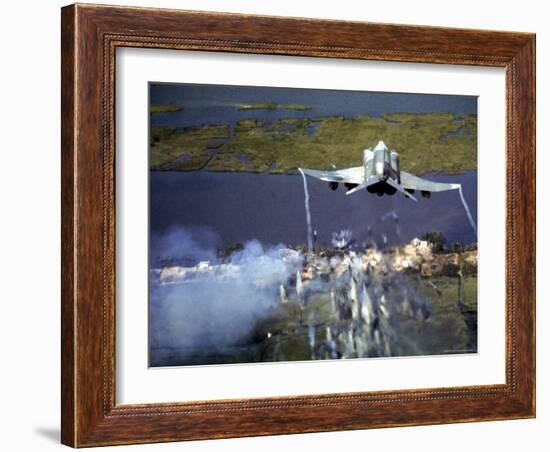 American F-4C Phantom Jet Streaming Contrails After Bombing Viet Cong Stronghold During Vietnam War-Larry Burrows-Framed Photographic Print