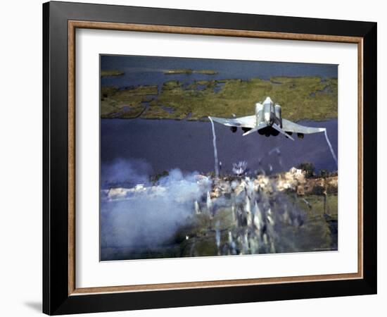 American F-4C Phantom Jet Streaming Contrails After Bombing Viet Cong Stronghold During Vietnam War-Larry Burrows-Framed Photographic Print