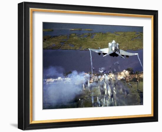 American F-4C Phantom Jet Streaming Contrails After Bombing Viet Cong Stronghold During Vietnam War-Larry Burrows-Framed Photographic Print