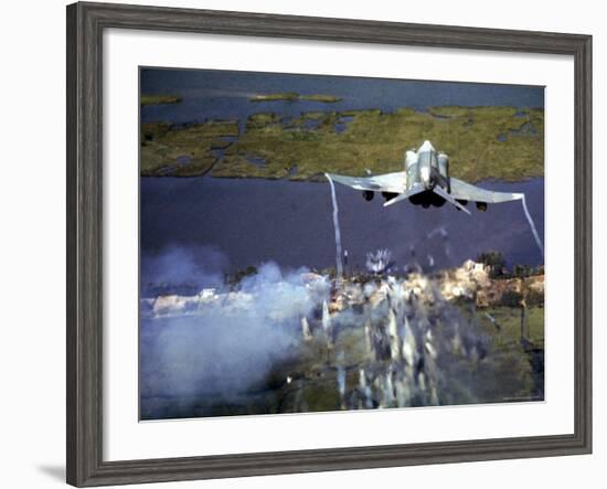 American F-4C Phantom Jet Streaming Contrails After Bombing Viet Cong Stronghold During Vietnam War-Larry Burrows-Framed Photographic Print