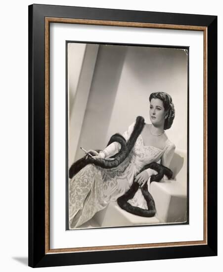 American Film Star Joan Bennett Models a Dress She Wears in Her Latest Picture "Girl Trouble"-null-Framed Art Print