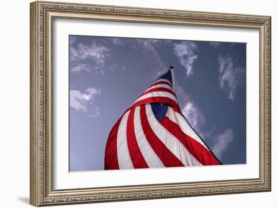 American Flag Against Blue-null-Framed Photo