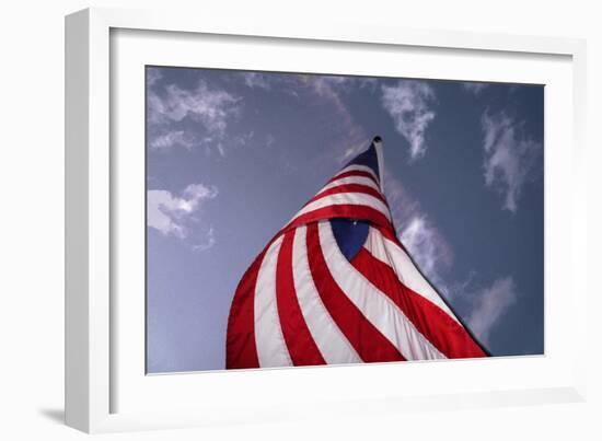 American Flag Against Blue-null-Framed Photo