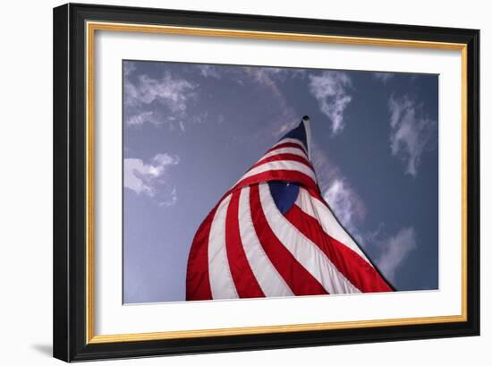 American Flag Against Blue-null-Framed Photo