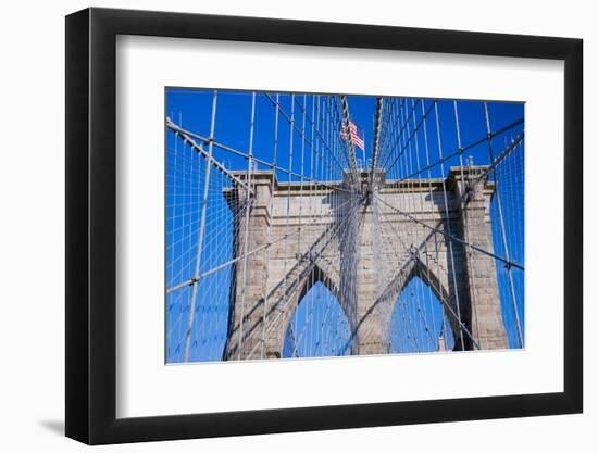 American flag flying over Brooklyn Bridge, New York City, New York-null-Framed Photographic Print