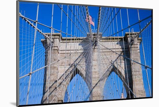 American flag flying over Brooklyn Bridge, New York City, New York-null-Mounted Photographic Print