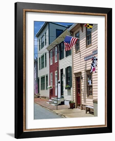 American Flag on Wooden Buildings on a Street in Annapolis, Maryland, USA-Hodson Jonathan-Framed Photographic Print