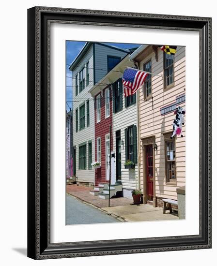 American Flag on Wooden Buildings on a Street in Annapolis, Maryland, USA-Hodson Jonathan-Framed Photographic Print