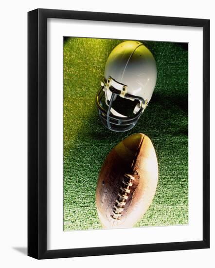 American Football Helmet and a Football-null-Framed Photographic Print