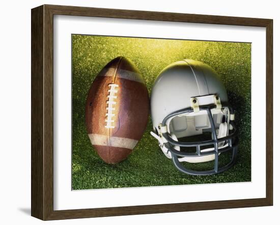 American Football Helmet and a Football-null-Framed Photographic Print