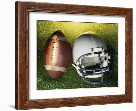 American Football Helmet and a Football-null-Framed Photographic Print