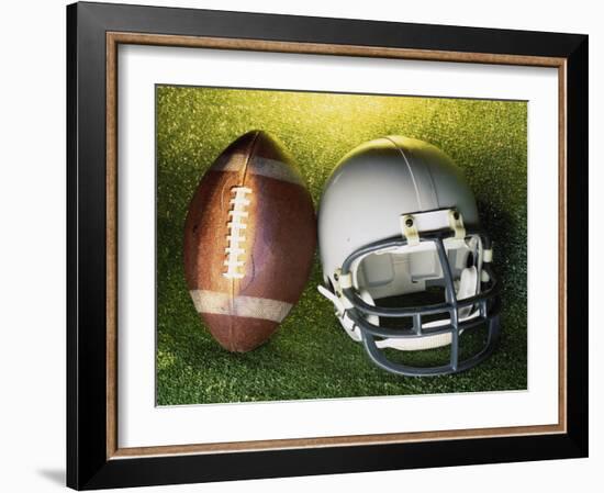 American Football Helmet and a Football-null-Framed Photographic Print