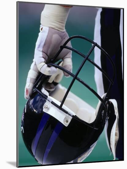 American Football Player Holding His Helmet-Chris Trotman-Mounted Photographic Print