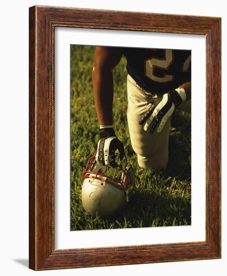American Football Player Kneeling on the Field-null-Framed Photographic Print