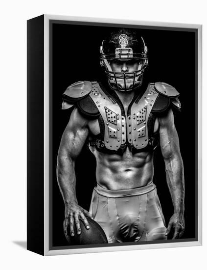 American Football Player with Ball Wearing Helmet and Protective Shields-NejroN Photo-Framed Premier Image Canvas