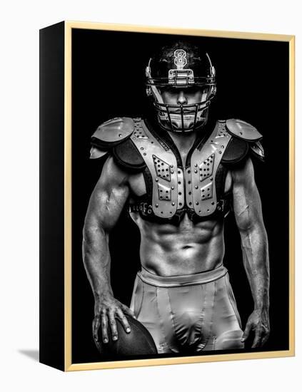 American Football Player with Ball Wearing Helmet and Protective Shields-NejroN Photo-Framed Premier Image Canvas