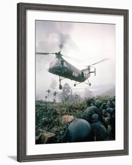 American Helicopter H-21 Hovering Above Soldiers in Combat Zone During Vietnam War-Larry Burrows-Framed Photographic Print