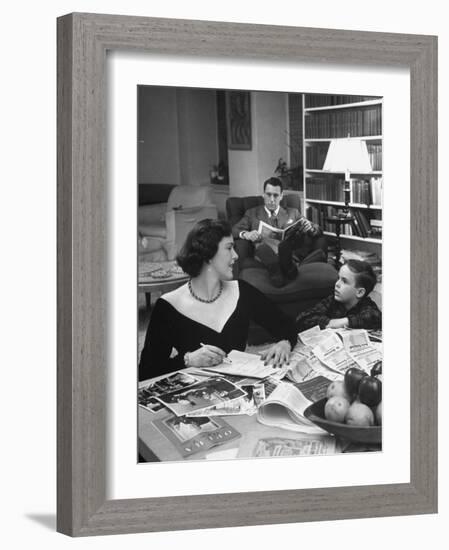 American Housewife Margaret Carson Sitting at Home with Her Husband and Son-Nina Leen-Framed Photographic Print