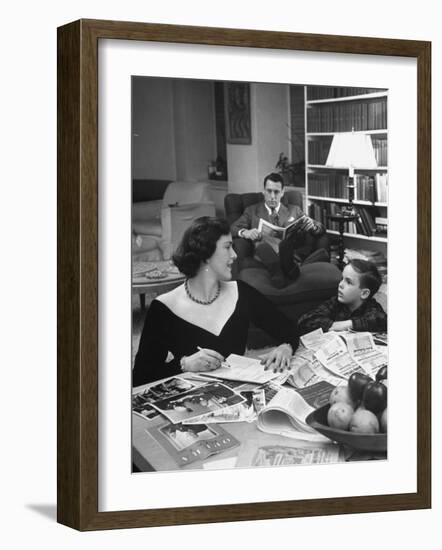 American Housewife Margaret Carson Sitting at Home with Her Husband and Son-Nina Leen-Framed Photographic Print