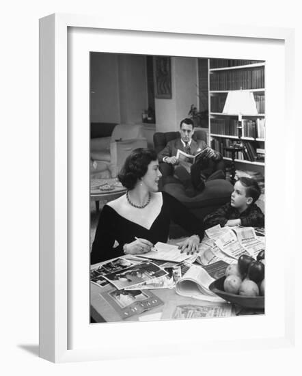 American Housewife Margaret Carson Sitting at Home with Her Husband and Son-Nina Leen-Framed Photographic Print