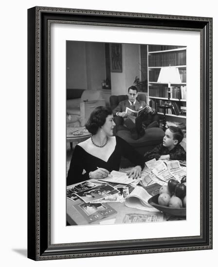 American Housewife Margaret Carson Sitting at Home with Her Husband and Son-Nina Leen-Framed Photographic Print