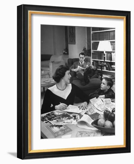 American Housewife Margaret Carson Sitting at Home with Her Husband and Son-Nina Leen-Framed Photographic Print