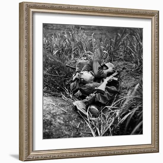 American Infantryman Terry Moore Taking Cover; Japanese Artillery Fire Explodes Nearby During-W^ Eugene Smith-Framed Photographic Print