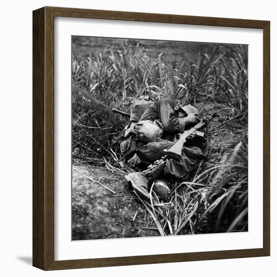 American Infantryman Terry Moore Taking Cover; Japanese Artillery Fire Explodes Nearby During-W^ Eugene Smith-Framed Photographic Print