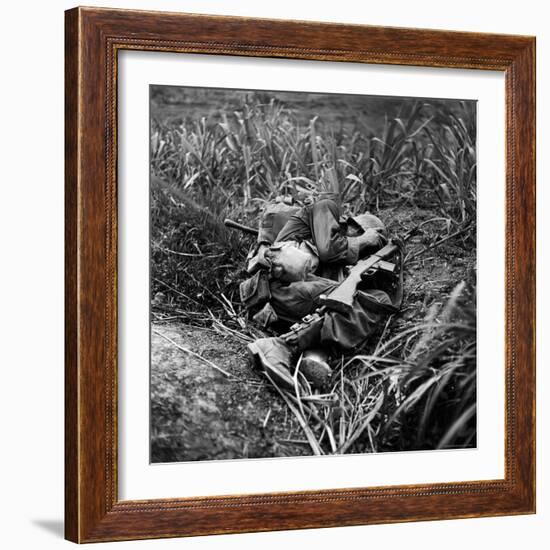 American Infantryman Terry Moore Taking Cover; Japanese Artillery Fire Explodes Nearby During-W^ Eugene Smith-Framed Photographic Print