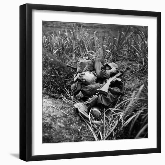 American Infantryman Terry Moore Taking Cover; Japanese Artillery Fire Explodes Nearby During-W^ Eugene Smith-Framed Photographic Print