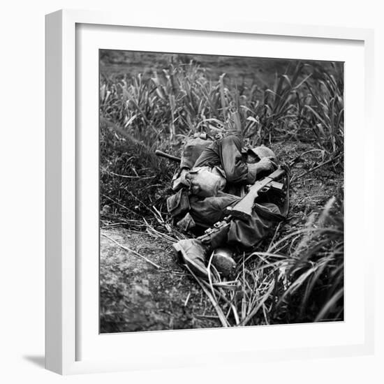 American Infantryman Terry Moore Taking Cover; Japanese Artillery Fire Explodes Nearby During-W^ Eugene Smith-Framed Photographic Print