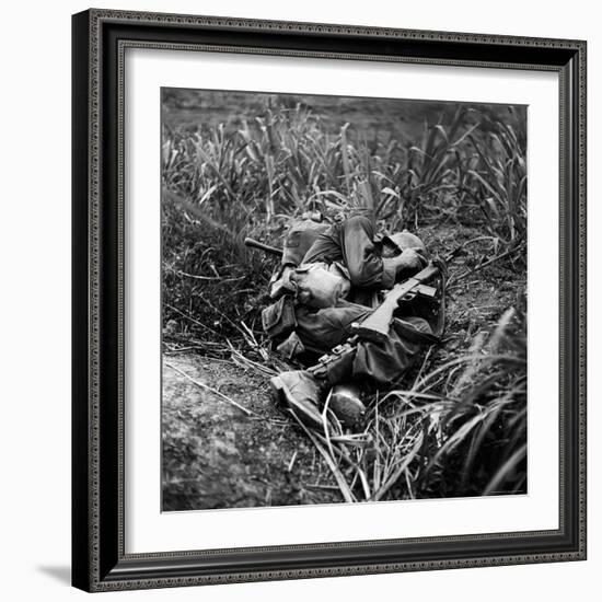 American Infantryman Terry Moore Taking Cover; Japanese Artillery Fire Explodes Nearby During-W^ Eugene Smith-Framed Photographic Print