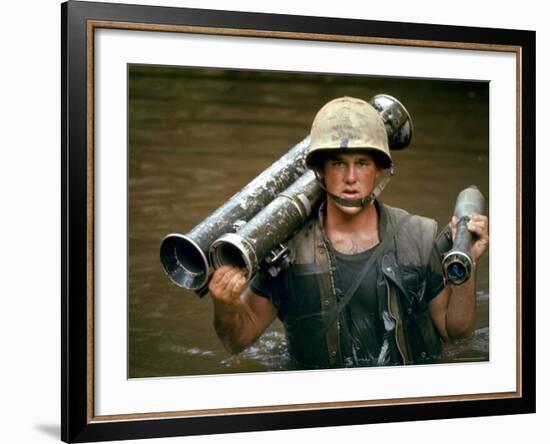 American Marine Pfc. Phillip Wilson Carrying Bazooka Across Stream Near DMZ During Vietnam War-Larry Burrows-Framed Photographic Print