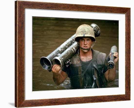 American Marine Pfc. Phillip Wilson Carrying Bazooka Across Stream Near DMZ During Vietnam War-Larry Burrows-Framed Photographic Print